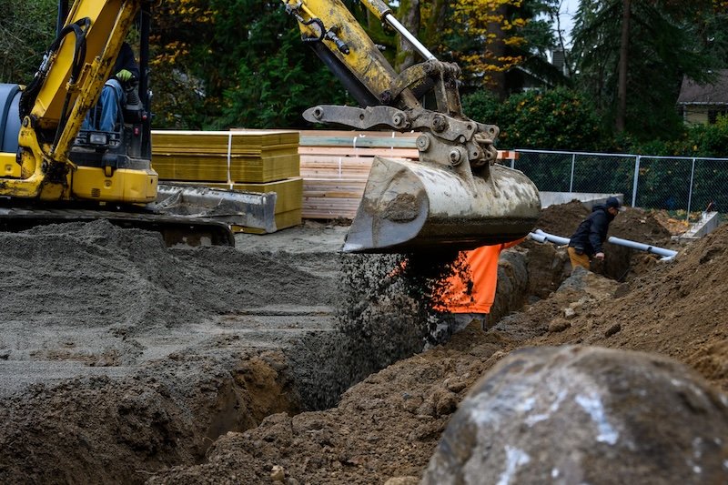 What Backfilling a Plumbing Trench Means