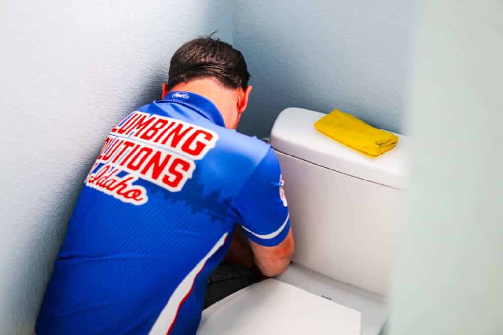boise plumber fixing toilet