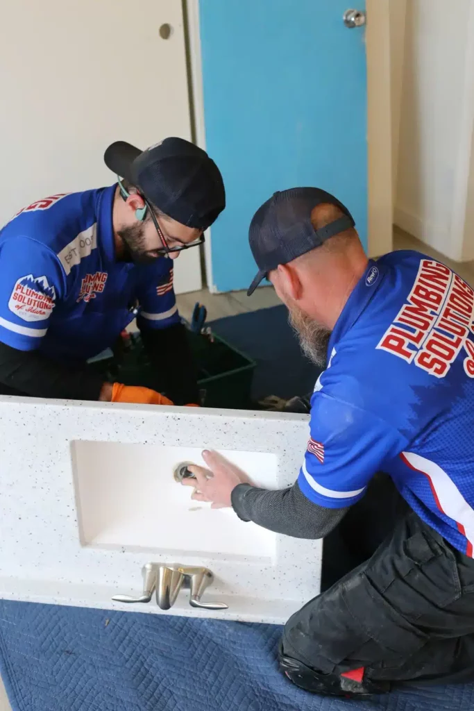 Plumbing Solutions of Idaho technicians performing plumbing installation in Boise