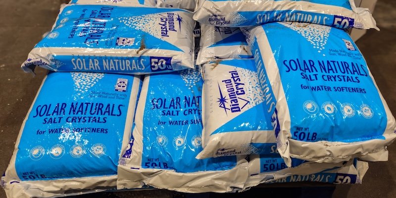 Minneapolis, USA - Jan, 2, 2026: Bags of Diamond Crystal brand water softener salt crystals stacked in a store display, used for treating hard water in residential and commercial softeners. Editorial Use.